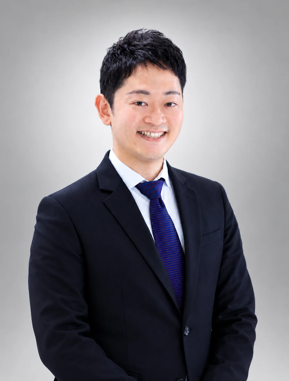 津田 覚